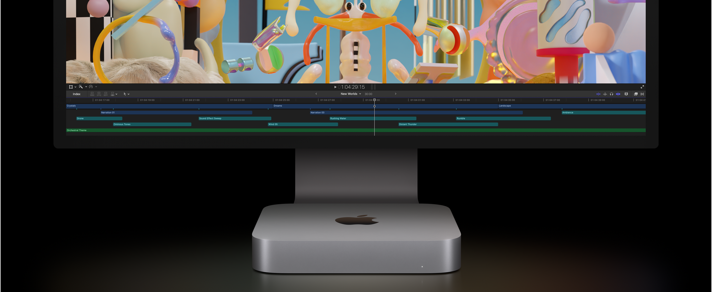 Vista frontal de un Mac mini y un Studio Display con un proyecto de edición de vídeo abierto en Final Cut Pro.